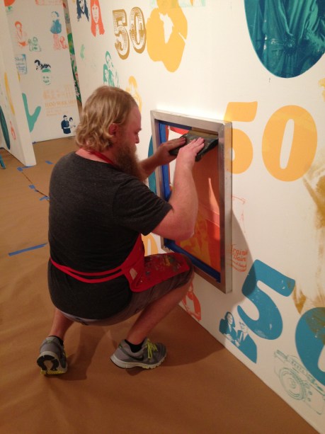 Travis Robertson showing some ninja screen printing techniques.